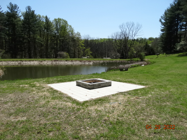 Fire pit near small pavilion